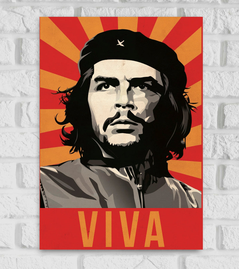 Revolutionary-style poster of Che Guevara with a bold red and yellow background featuring radiating sunburst rays. Che is depicted in a high-contrast black, white, and gray portrait wearing his iconic beret with a star, looking determined and forward. The word "VIVA" is written in large capital letters at the bottom in a red and gold color scheme