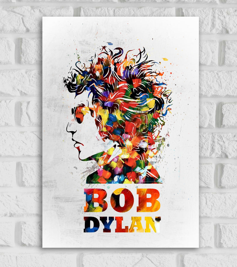 c poster of Bob Dylan featuring a colorful, abstract silhouette portrait with splashes of red, yellow, blue, green, and purple forming his hair and clothing. The background is white with subtle texture, and the name 'BOB DYLAN' is written below in bold, multicolored letters matching the style of the artwork