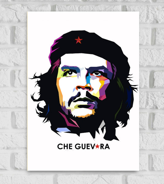 Modern pop-art style poster of Che Guevara with a white background. The portrait features bold, colorful geometric shapes in shades of purple, yellow, blue, red, and orange, giving it a vibrant and contemporary look. Che is shown wearing his iconic black beret with a red star. Below the image, the name "CHE GUEVARA" is written in black capital letters, with the second "A" replaced by a red star