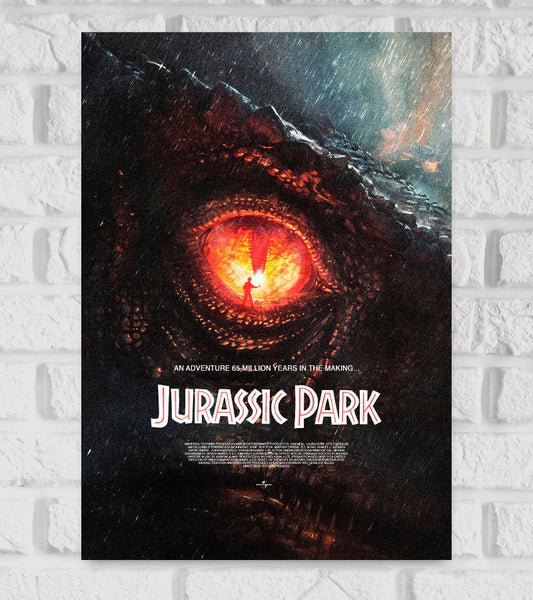 Poster of Jurassic Park featuring a dramatic close-up of a dinosaur's eye with a fiery glow. Reflected in the eye is a small silhouette of a person holding a flare, standing in the rain. The tagline reads “An adventure 65 million years in the making...” with the title “Jurassic Park” prominently displayed below in bold white and red letters  American science fiction action film Hollywood Actor Steven Spielberg  Richard Attenborough