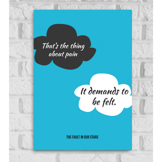 Poster of the movie 'The Fault in Our Stars' featuring a minimalist design with a bright blue background. Two cloud shapes are in the center—one black with white text that reads 'That's the thing about pain' and the other white with black text that reads 'It demands to be felt.' At the bottom, the title 'THE FAULT IN OUR STARS' is printed in black capital letters