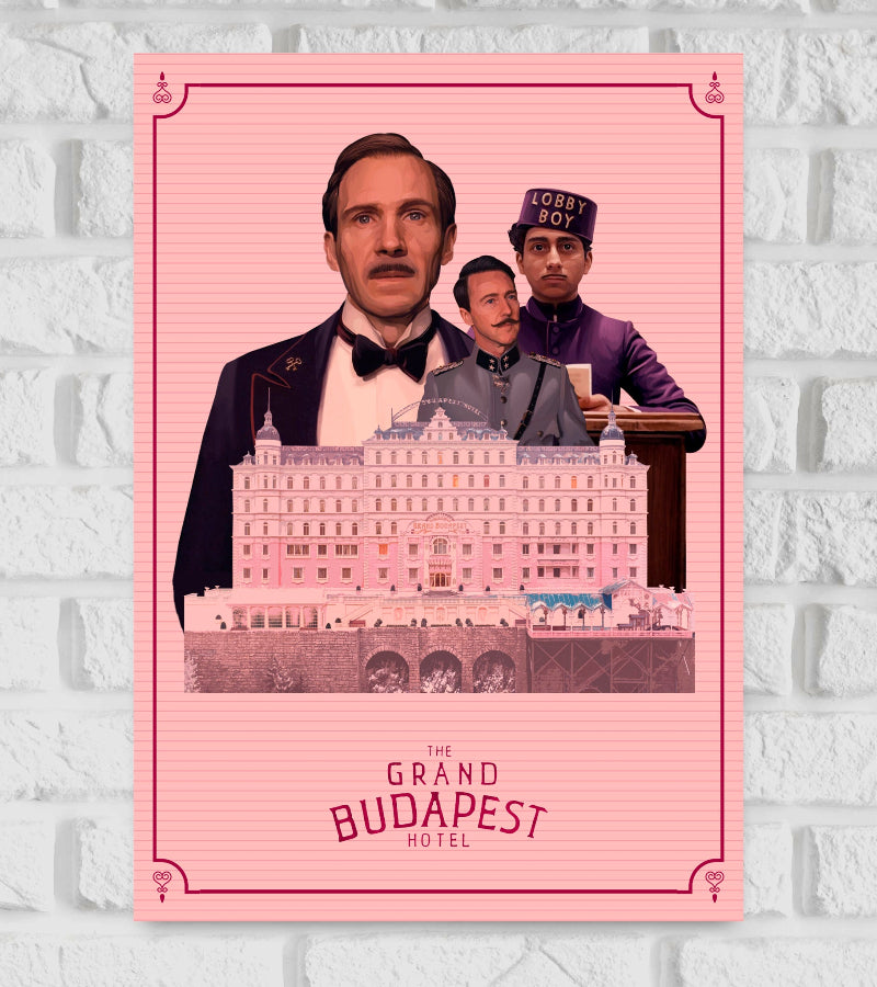Poster of The Grand Budapest Hotel featuring illustrated portraits of three main characters, including the hotel concierge and the lobby boy, standing above a detailed, pastel pink depiction of the iconic Grand Budapest Hotel building. The background is light pink with thin horizontal lines and decorative borders, with the movie title "The Grand Budapest Hotel" elegantly displayed at the bottom in dark pink lettering Hollywood Comedy Adventure Wes Anderson